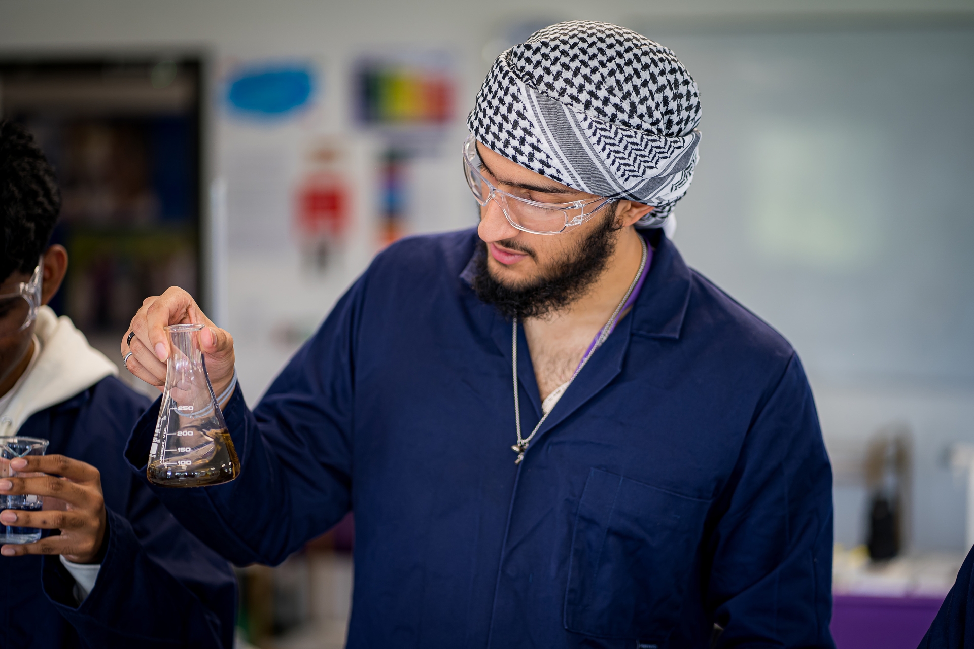 Students at Solihull Sixth Form College participate in a science experiment